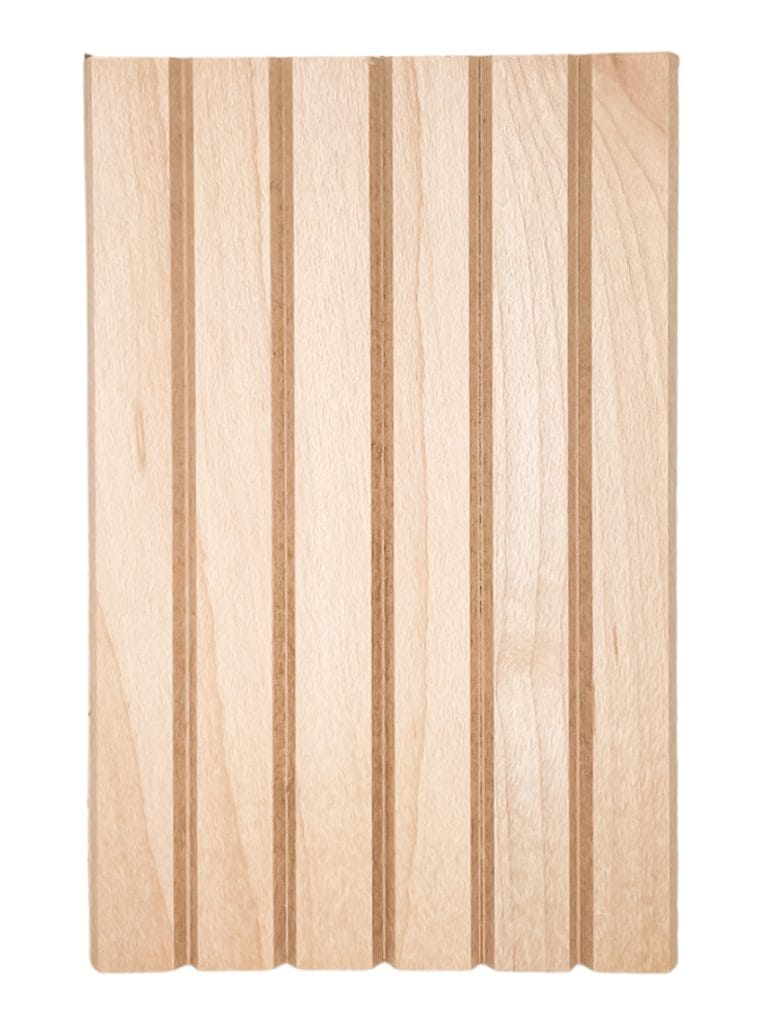 Light wood tambour panel with five vertical grooves, ideal for modern interiors and feature walls by Surfacing Solution. | Custom tambour and architectural wood specialists