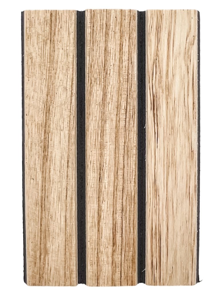 Close-up of a Surfacing Solution tambour wall panel with three vertical light wood planks and two slim black accent grooves. | Custom tambour and architectural wood specialists