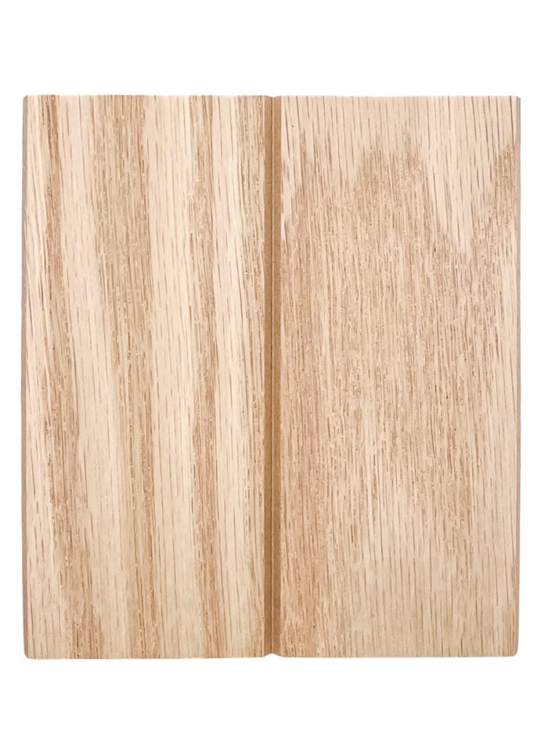 Light-colored white oak tambour panel featuring a centered vertical groove and natural wood grain, shown on a plain white background. | Custom tambour and architectural wood specialists