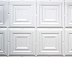 White tambour wall panels with raised geometric squares and subtle corner details, adding modern 3D texture to any interior space. | Custom tambour and architectural wood specialists White tambour wall panels with raised geometric squares and subtle corner details, adding modern 3D texture to any interior space. | Custom tambour and architectural wood specialists