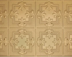 Gold tin ceiling tiles with floral and geometric embossing, paired with white oak tambour wall panels for vintage textured style. | Custom tambour and architectural wood specialists Gold tin ceiling tiles with floral and geometric embossing, paired with white oak tambour wall panels for vintage textured style. | Custom tambour and architectural wood specialists