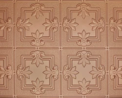 Copper embossed ceiling tiles with a floral pattern complement tambour fluted wood wall panels for a stylish, unified interior design. | Custom tambour and architectural wood specialists Copper embossed ceiling tiles with a floral pattern complement tambour fluted wood wall panels for a stylish, unified interior design. | Custom tambour and architectural wood specialists