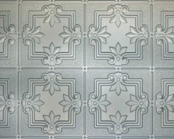 Embossed decorative tiles with geometric and floral patterns complement tambour or fluted wood panels for an elegant interior finish. | Custom tambour and architectural wood specialists Embossed decorative tiles with geometric and floral patterns complement tambour or fluted wood panels for an elegant interior finish. | Custom tambour and architectural wood specialists